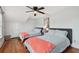 Well-lit bedroom with two twin beds and ceiling fan at 834 11Th N St, St Petersburg, FL 33705