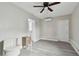 Bedroom with ceiling fan, mini-split AC unit and window at 834 11Th N St, St Petersburg, FL 33705