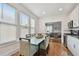 Bright dining area with glass-top table and view into living room at 834 11Th N St, St Petersburg, FL 33705