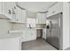 Modern kitchen with white shaker cabinets and quartz countertops at 834 11Th N St, St Petersburg, FL 33705