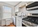 Updated kitchen featuring stainless steel appliances and granite countertops at 834 11Th N St, St Petersburg, FL 33705