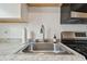 Stainless steel kitchen sink with granite countertop at 834 11Th N St, St Petersburg, FL 33705