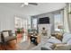 Living room with hardwood floors, fireplace, and open floor plan at 834 11Th N St, St Petersburg, FL 33705