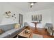 Living room featuring hardwood floors and gray couch at 834 11Th N St, St Petersburg, FL 33705