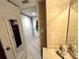 View of bathroom with mirrored closet doors at 880 Mandalay Ave # N111, Clearwater Beach, FL 33767