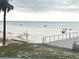 Beach access, sandy shore, and ocean view at 880 Mandalay Ave # N111, Clearwater Beach, FL 33767