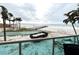 Balcony view of the beach and pier at 880 Mandalay Ave # N111, Clearwater Beach, FL 33767