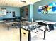 Recreation room with foosball, ping pong, and air hockey at 880 Mandalay Ave # N111, Clearwater Beach, FL 33767