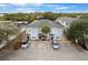 Aerial view of a triplex with parking and landscaping at 9206 Bella Terraza Way, Temple Terrace, FL 33617