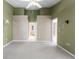 Primary bedroom with access to bathroom and other rooms at 9287 New Orleans Dr, Weeki Wachee, FL 34613