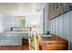 Cozy bedroom featuring hardwood floors, french doors and eclectic accents at 10350 54Th N Ave, St Petersburg, FL 33708