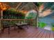 Charming outdoor seating with a pergola, ideal for enjoying evening sunsets and outdoor gatherings at 10350 54Th N Ave, St Petersburg, FL 33708