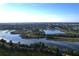 Wide aerial view of the neighborhood and lake at 10770 43Rd N St # 601, Clearwater, FL 33762