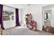 bedroom with playful decor and access to another room at 1212 Markley Dr, Largo, FL 33770