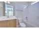 Clean bathroom with a shower/tub combo and updated vanity at 13903 Natures Reserve Dr, Lithia, FL 33547