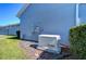 Exterior view of a Generac generator installed on the property at 13903 Natures Reserve Dr, Lithia, FL 33547