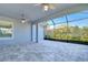 Covered lanai with ceiling fans and paver flooring at 13903 Natures Reserve Dr, Lithia, FL 33547