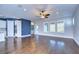 Spacious living area with hardwood floors and ceiling fan at 13903 Natures Reserve Dr, Lithia, FL 33547