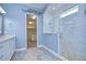 Main bathroom with a large shower and walk-in closet at 13903 Natures Reserve Dr, Lithia, FL 33547
