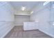 Large walk-in closet with ample shelving and drawers at 13903 Natures Reserve Dr, Lithia, FL 33547