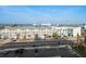 Aerial view of townhouses and parking lot near the ocean at 15462 Gulf Blvd # 603, Madeira Beach, FL 33708
