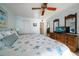 Spacious bedroom with king bed, dresser, and ocean view at 15462 Gulf Blvd # 603, Madeira Beach, FL 33708