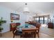 Dining area with glass-top table and four chairs at 15462 Gulf Blvd # 603, Madeira Beach, FL 33708