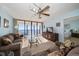 Bright living room with ocean view and access to balcony at 15462 Gulf Blvd # 603, Madeira Beach, FL 33708