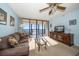 Living room with ocean view and comfortable seating at 15462 Gulf Blvd # 603, Madeira Beach, FL 33708