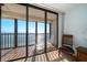 Private balcony overlooking the ocean with lounge chair at 15462 Gulf Blvd # 603, Madeira Beach, FL 33708