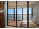 Ocean view from bedroom with sliding doors to balcony at 15462 Gulf Blvd # 603, Madeira Beach, FL 33708