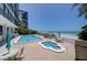Relaxing pool and spa area steps from the beach at 15462 Gulf Blvd # 603, Madeira Beach, FL 33708