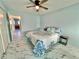 Bright bedroom with a double bed and ensuite bathroom at 2311 Brisbane St # 65, Clearwater, FL 33763