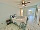 Bedroom with a bed, nightstand and access to an office at 2311 Brisbane St # 65, Clearwater, FL 33763