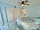 Bright bedroom with a double bed and large closet at 2311 Brisbane St # 65, Clearwater, FL 33763