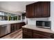 Modern kitchen with stainless steel appliances, ample counter space and large windows at 2351 Leslee Lake N Dr, St Petersburg, FL 33713