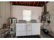 Laundry room with washer, dryer and hot water heater at 2351 Leslee Lake N Dr, St Petersburg, FL 33713
