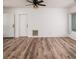 Spacious living room featuring hardwood floors and lots of natural light at 2351 Leslee Lake N Dr, St Petersburg, FL 33713