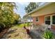 Cozy patio with table and chairs, adjacent to home at 2351 Leslee Lake N Dr, St Petersburg, FL 33713