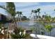 Resort-style community with lake, fountain, and lush landscaping at 2400 Feather Sound Dr # 717, Clearwater, FL 33762