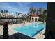 Inviting community pool with gazebo and patio area at 2400 Feather Sound Dr # 717, Clearwater, FL 33762