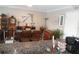 Bright dining area with wooden table and chairs at 2400 Feather Sound Dr # 717, Clearwater, FL 33762