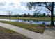 Scenic view of a golf course with water features at 2400 Feather Sound Dr # 717, Clearwater, FL 33762