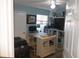 Home office with desk, chair and printer at 2400 Feather Sound Dr # 717, Clearwater, FL 33762