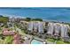 Aerial view of condos, pool, parking, and water views at 2825 Terra Ceia Bay Blvd # 1504, Palmetto, FL 34221