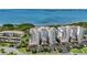 Aerial view of two upscale condo buildings with garages, parking and water views at 2825 Terra Ceia Bay Blvd # 1504, Palmetto, FL 34221