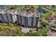 Aerial view of the condo buildings, highlighting the community pool and surrounding landscape at 2825 Terra Ceia Bay Blvd # 1504, Palmetto, FL 34221