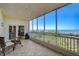 Screened balcony with seating area and panoramic views of the water at 2825 Terra Ceia Bay Blvd # 1504, Palmetto, FL 34221
