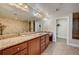 Elegant bathroom features double sinks with granite countertops and beautiful tile work at 2825 Terra Ceia Bay Blvd # 1504, Palmetto, FL 34221