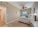Bright bedroom featuring wood floors, ceiling fan, and a serene view from the window at 2825 Terra Ceia Bay Blvd # 1504, Palmetto, FL 34221